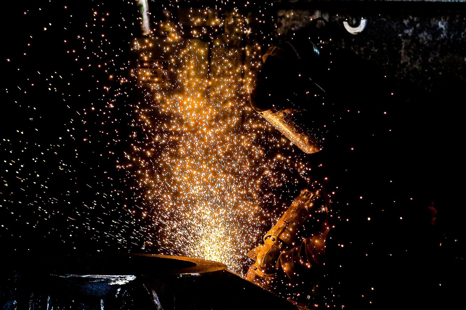 Sparks around a welder at work